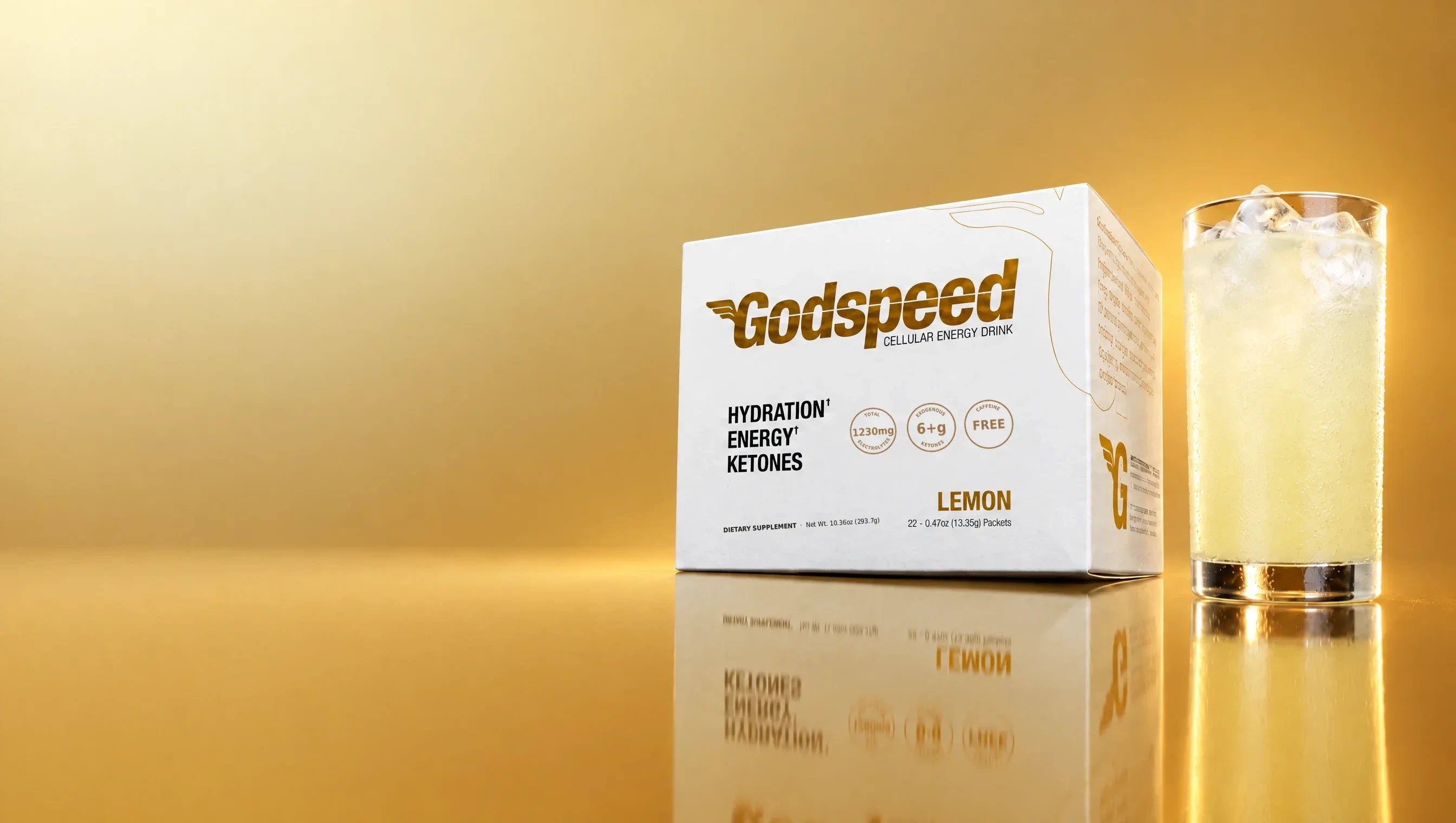 Godspeed Lemon box beside a glass of the drink